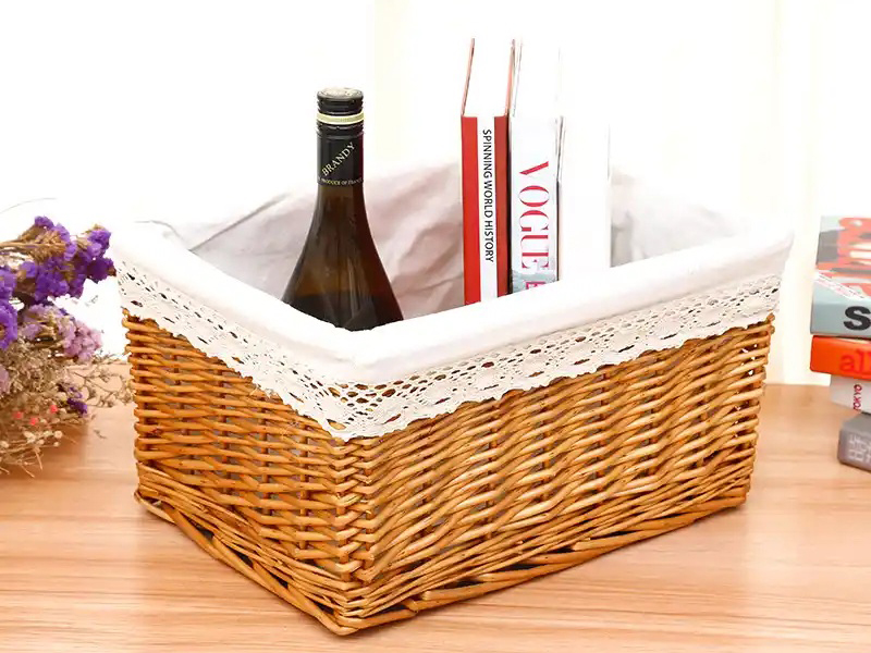 Wicker storage basket with reinforced base
